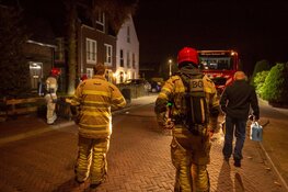 Bankstel in brand gestoken in Huizen