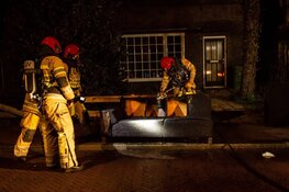 Bankstel in brand gestoken in Huizen