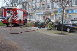 Brand in ondergrondse container aan de Wadden in Huizen