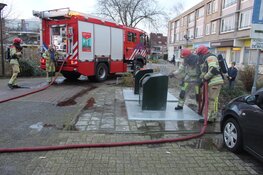Brand in ondergrondse container aan de Wadden in Huizen