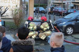 Brand in ondergrondse container aan de Wadden in Huizen
