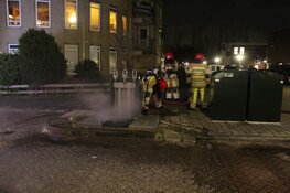 Brand in ondergrondse container in Huizen