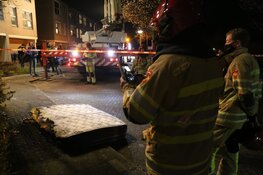 Brand in portiekwoning in Huizen