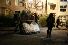 Brand in portiekwoning in Huizen