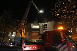 Brand in portiekwoning in Huizen