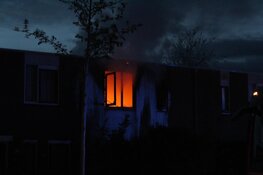 Uitslaande brand in woning Huizen