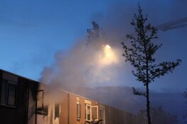 Uitslaande brand in woning Huizen