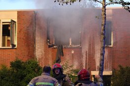 Uitslaande brand in woning Huizen