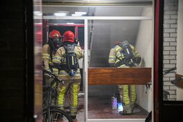 Brand in portiek in Hilversum