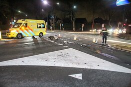 Motorrijder en auto in botsing in Huizen