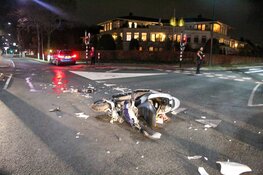 Motorrijder en auto in botsing in Huizen