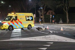 Motorrijder en auto in botsing in Huizen