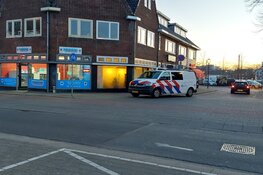Politie in kogelwerende vesten valt panden Hilversum binnen