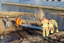 Jongetje bevrijd van eilandje in Huizen