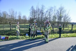 Automobilist te water in Baarn