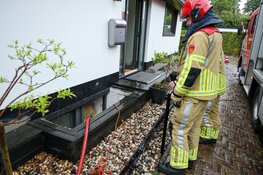 Kelder van woning onder water in Laren