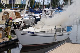 Brand op boot in jachthaven Huizen