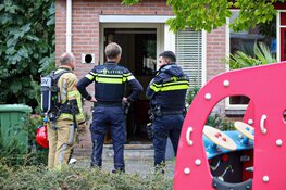 Hondje in woning vol rook in Laren