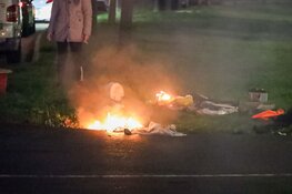 Spontane brand in bedrijfsbus in Huizen