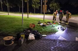 Spontane brand in bedrijfsbus in Huizen