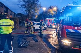 Brand in achtertuin in Huizen