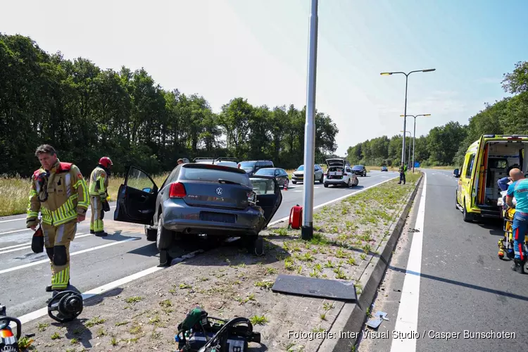 Aanrijding op afrit Huizen, frontale botsing