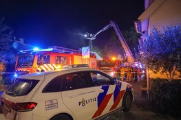 Brand in woning in Huizen, één persoon aangehouden