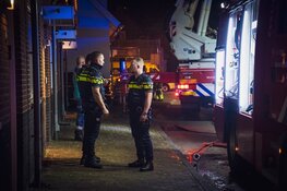 Brand in woning in Huizen, één persoon aangehouden