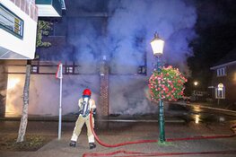Brand verwoest kledingwinkel in Huizen