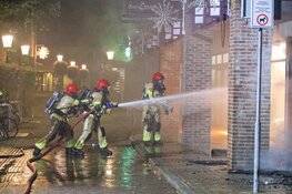 Brand verwoest kledingwinkel in Huizen