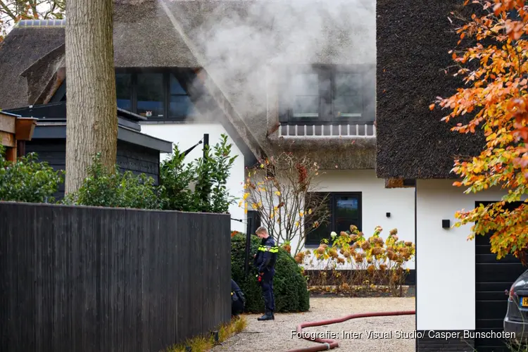 Middelbrand in kelder woning in Laren