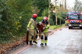 Middelbrand in kelder woning in Laren