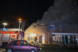Uitslaande woningbrand in Huizen