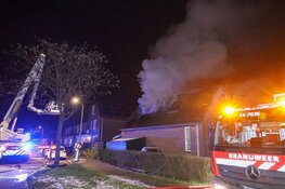 Uitslaande woningbrand in Huizen