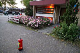 Brand in trappenhuis van flat in Huizen