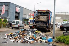 Inhoud van vuilniswagen in brand