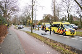 Botsing tussen motorrijder en fietser aan de Naarderstraat in Huizen
