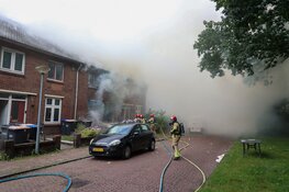 Grote uitslaande brand in woning Huizen