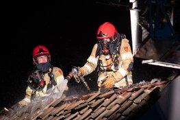 Brand door blikseminslag in woning Hilversum