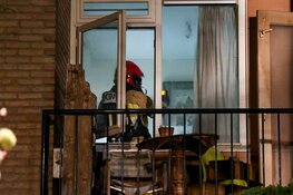 Man uit brandende woning gered