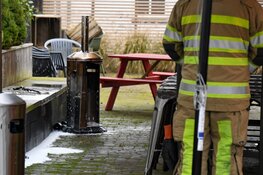 Brandje op terras wijnbar