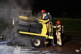 Strooiwagen in brand