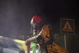 Strooiwagen in brand