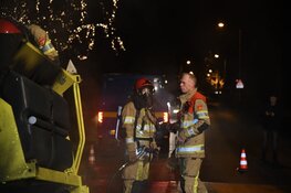 Strooiwagen in brand