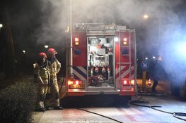 Strooiwagen in brand