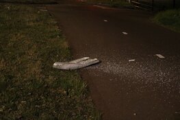 Auto ramt lantaarn en hek in Hilversum