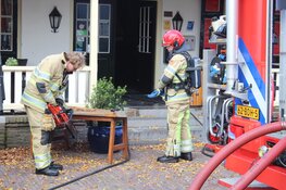 Middelbrand gebouw in Huizen