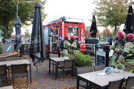 Middelbrand gebouw in Huizen